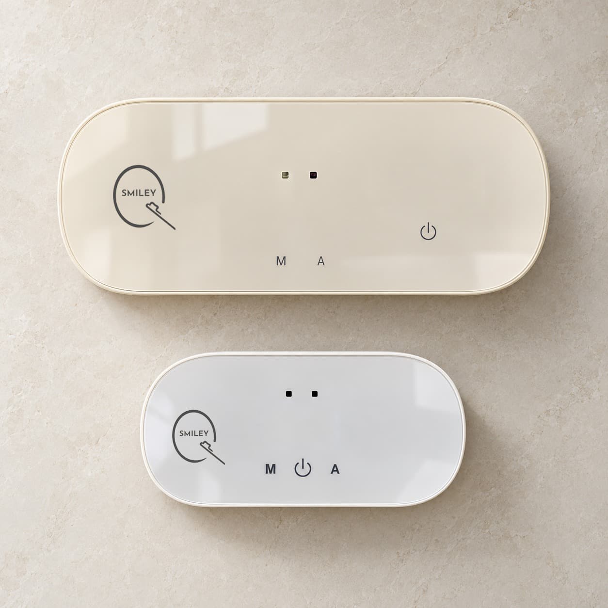 QSmiley in Pearl, Dune, Activated Noir mounted on a wall with toothbrushes